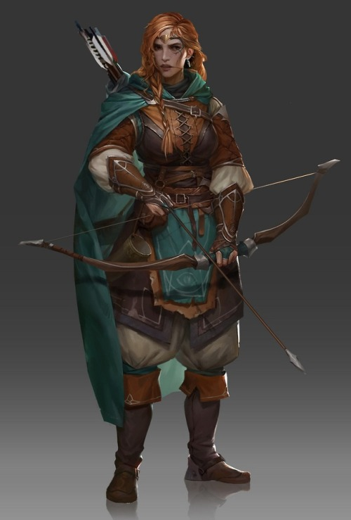 Humaine Rousse équipée d'un arc et d'une tenue en cuir